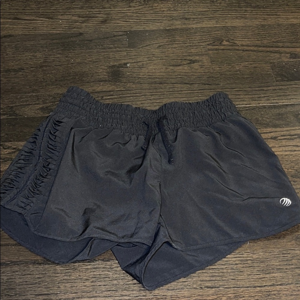 mpg black shorts with design down the side